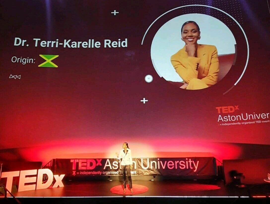 Terri-Karelle delivering her TEDx Talk at Aston University
